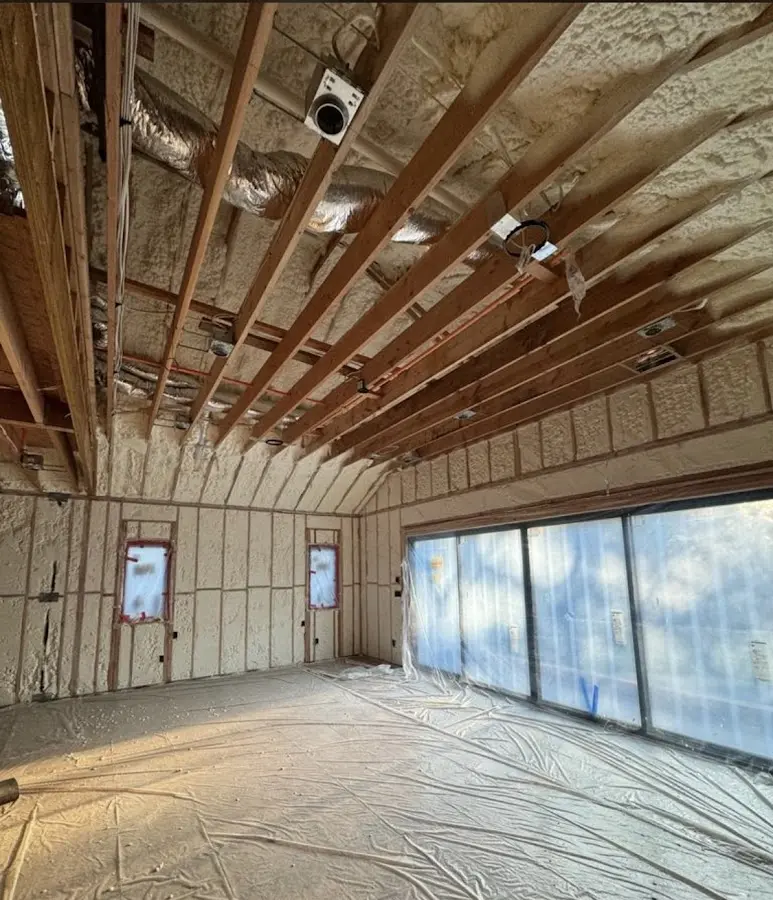 Interior walls and ceiling insulated with spray foam during new construction in Temple City